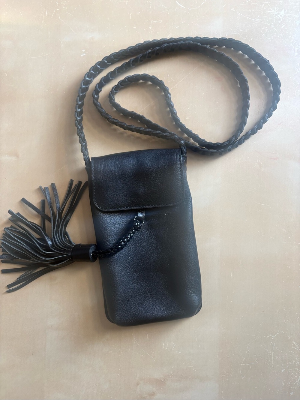 Joelle Hawkens Black Leather Phone Crossbody Bag Braided Strap Tassel Boho